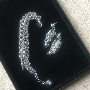 Stainless steel bracelet and earring set